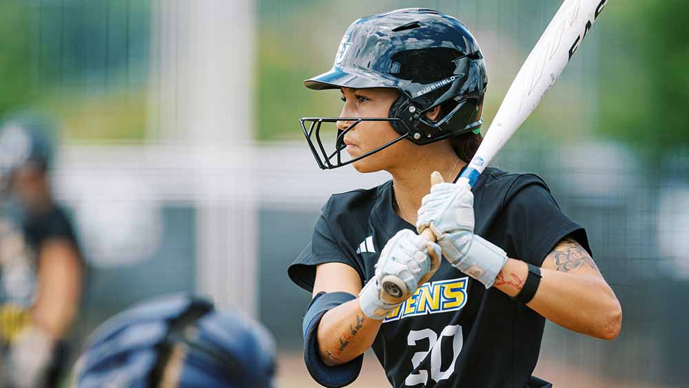 softball batter lining up to bat