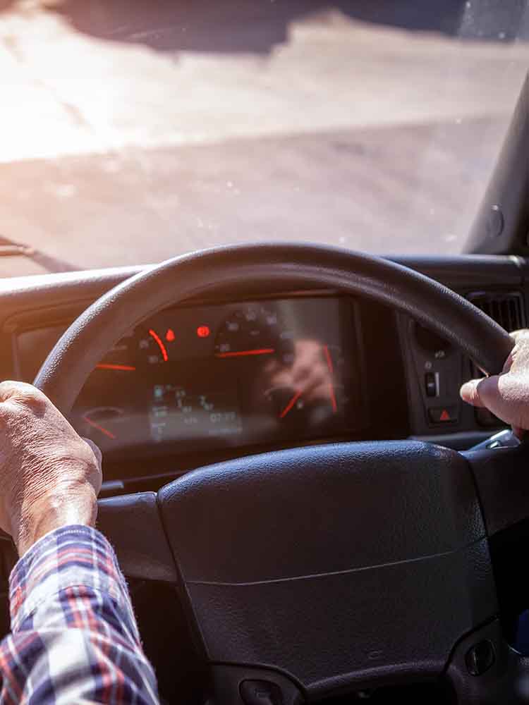 driver behind wheel