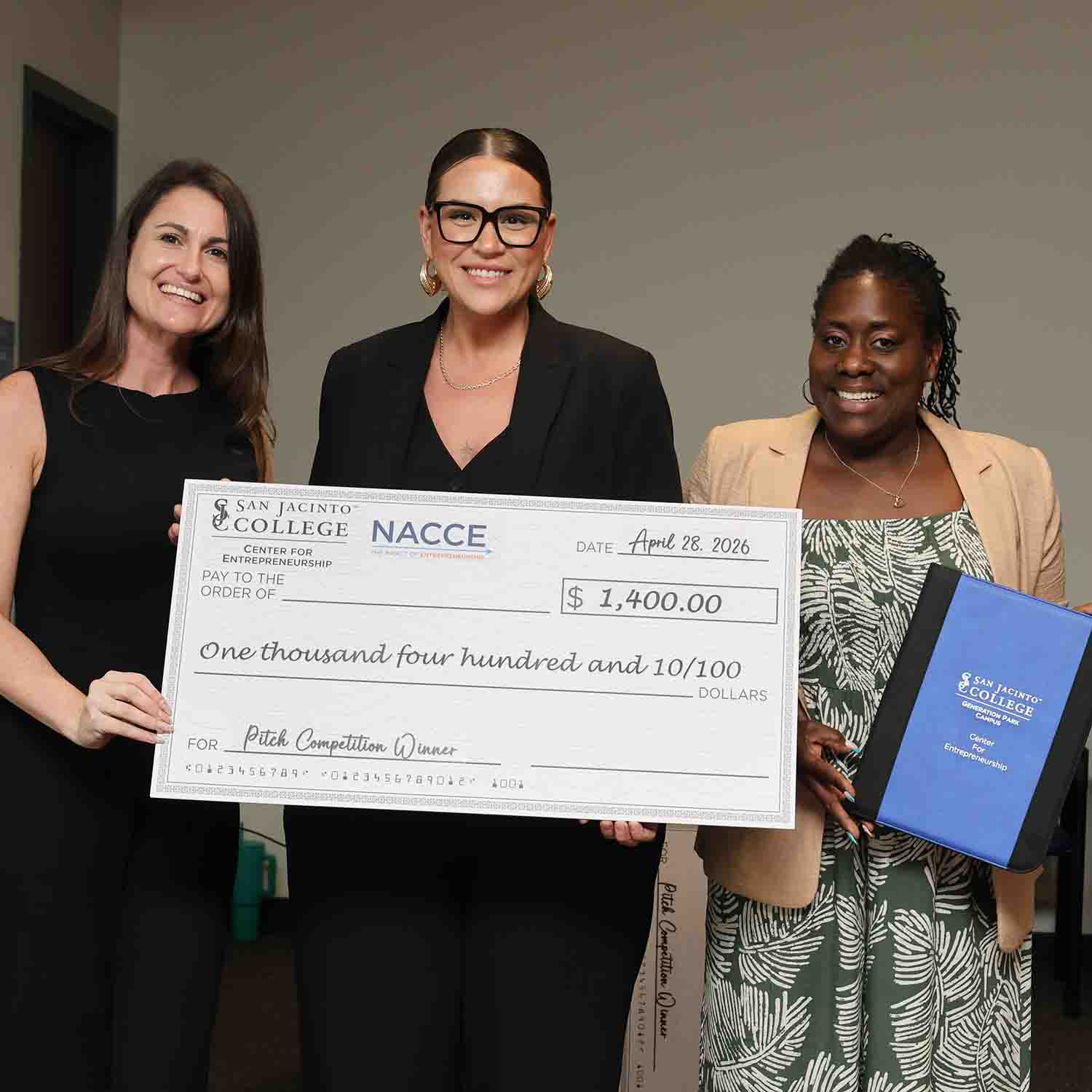 From left to right: Emcee Ashley Brown, second place winner Madison Beal, and Patricia Wells